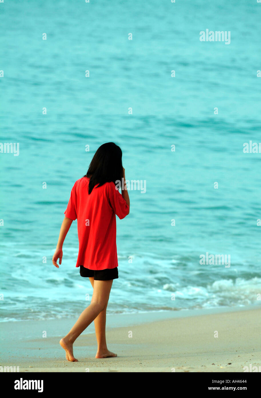 thai girl female red tshirt beach young woman Stock Photo
