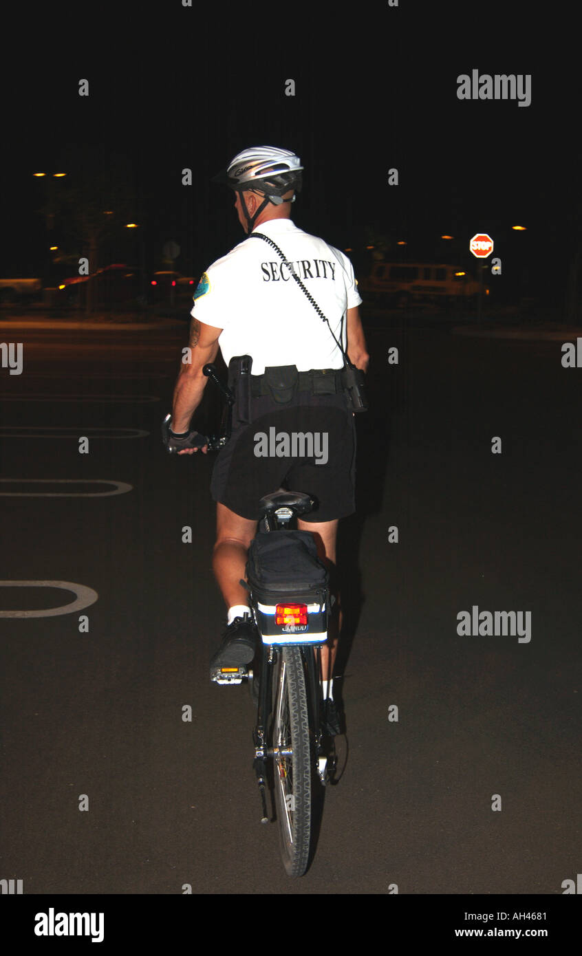 Security guard on bicycle Stock Photo Alamy