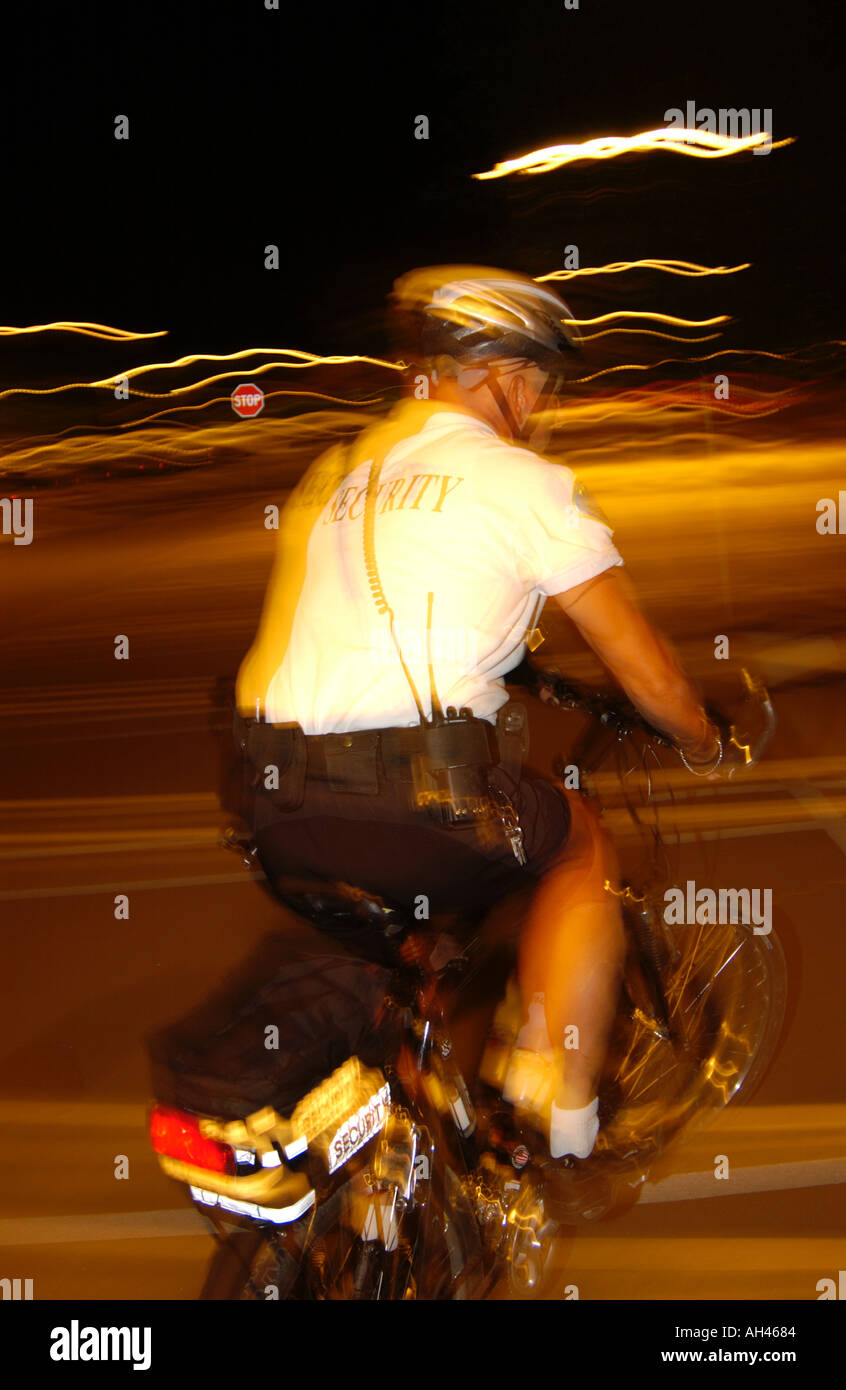 Security guard on bicycle Stock Photo Alamy