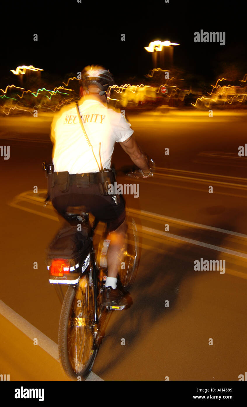 Security guard on bicycle Stock Photo Alamy