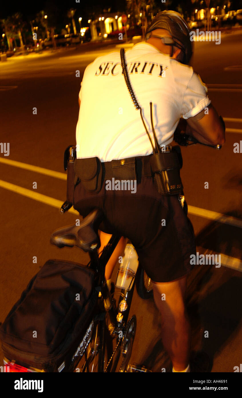 Security guard on bicycle Stock Photo Alamy