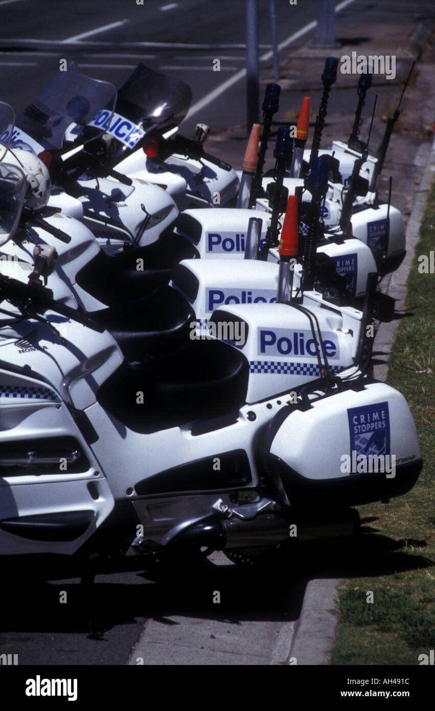 A line of police motorcycles parked while officers have lunch 2037 Stock Photo