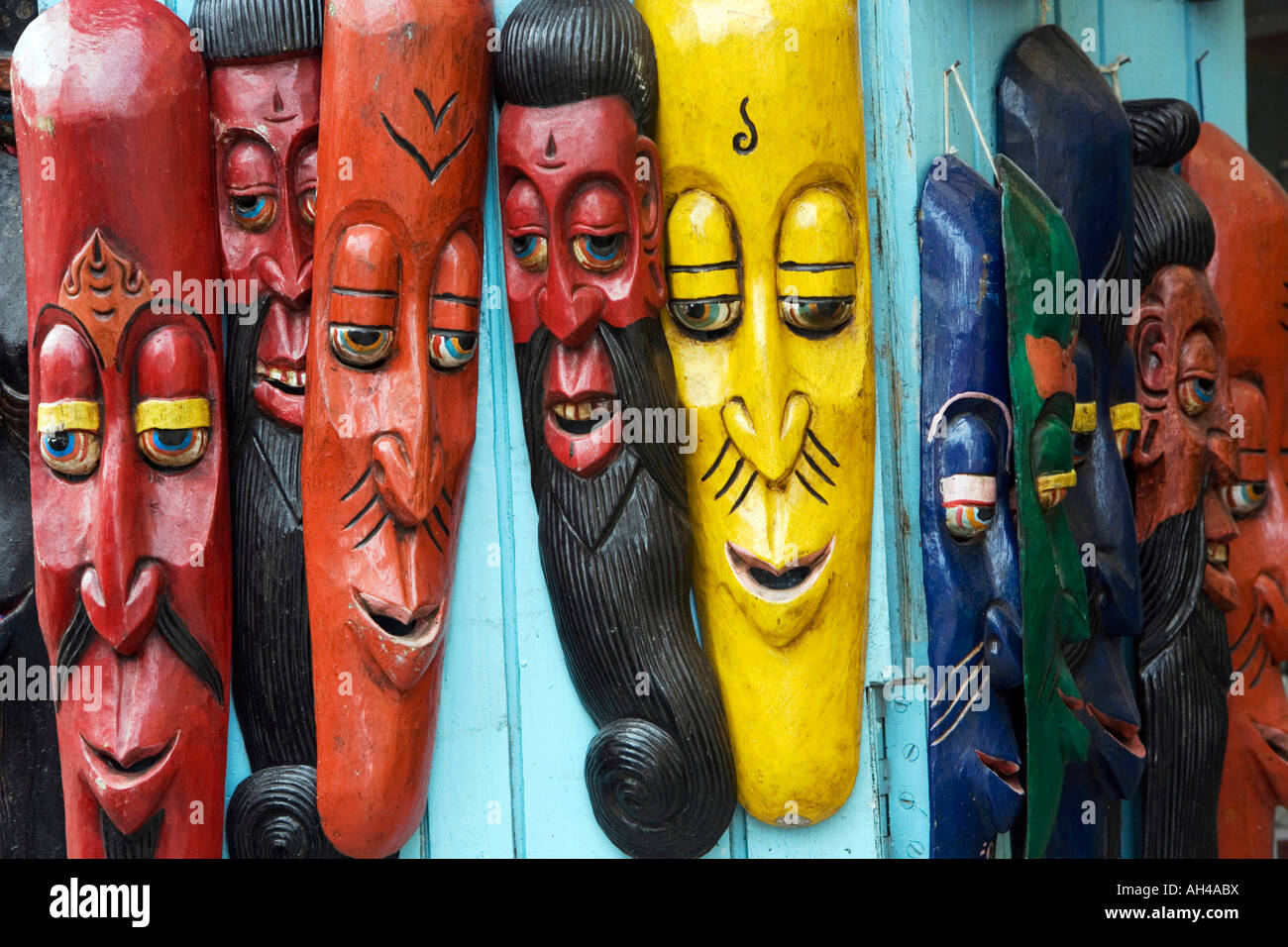 Long carved face mask in shop doorway. Kathmandu, Nepal Stock Photo Alamy
