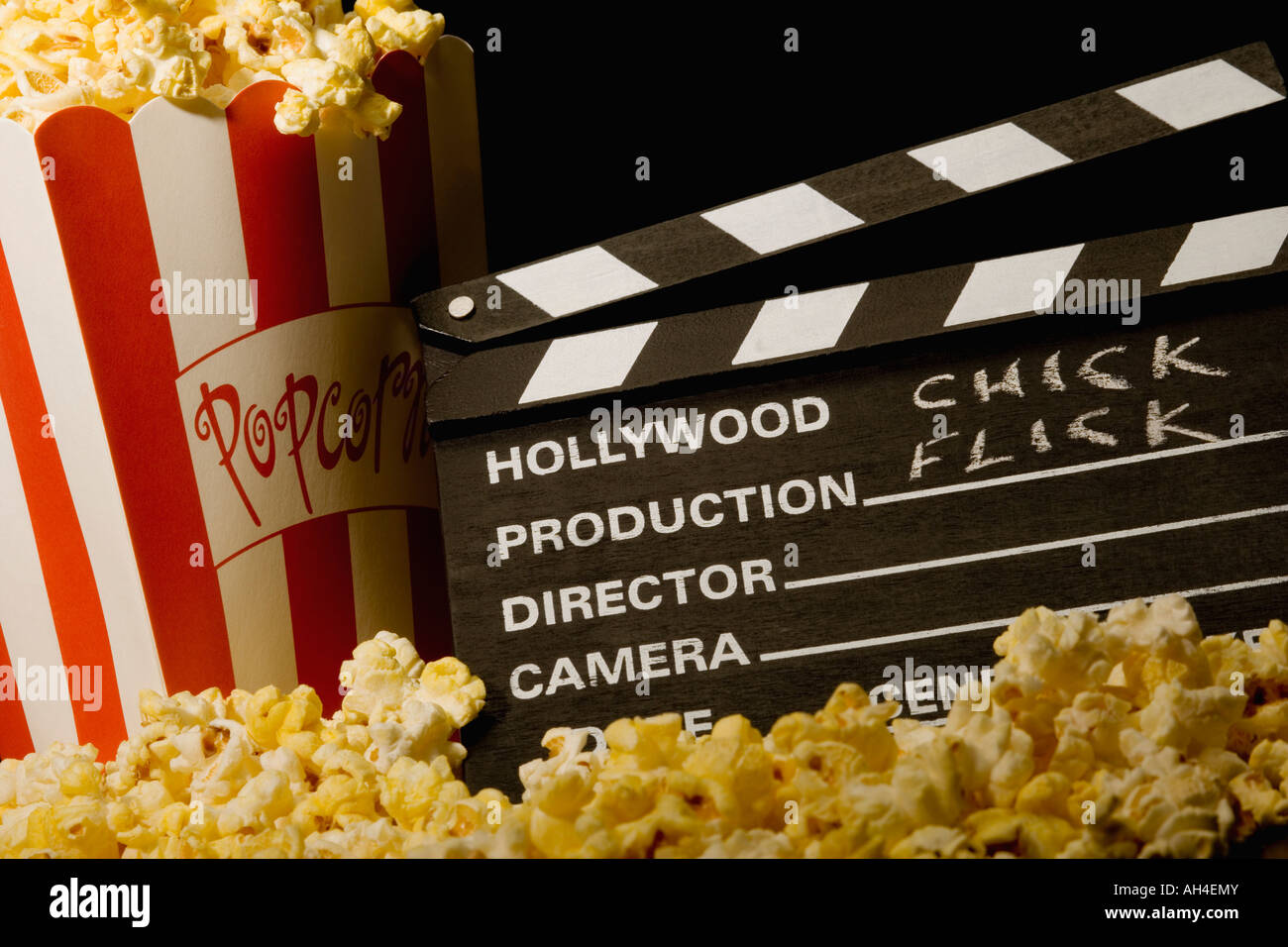 Movie clapboard with popcorn Stock Photo