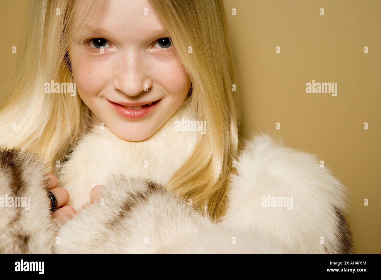 Girl in a fur coat Stock Photo
