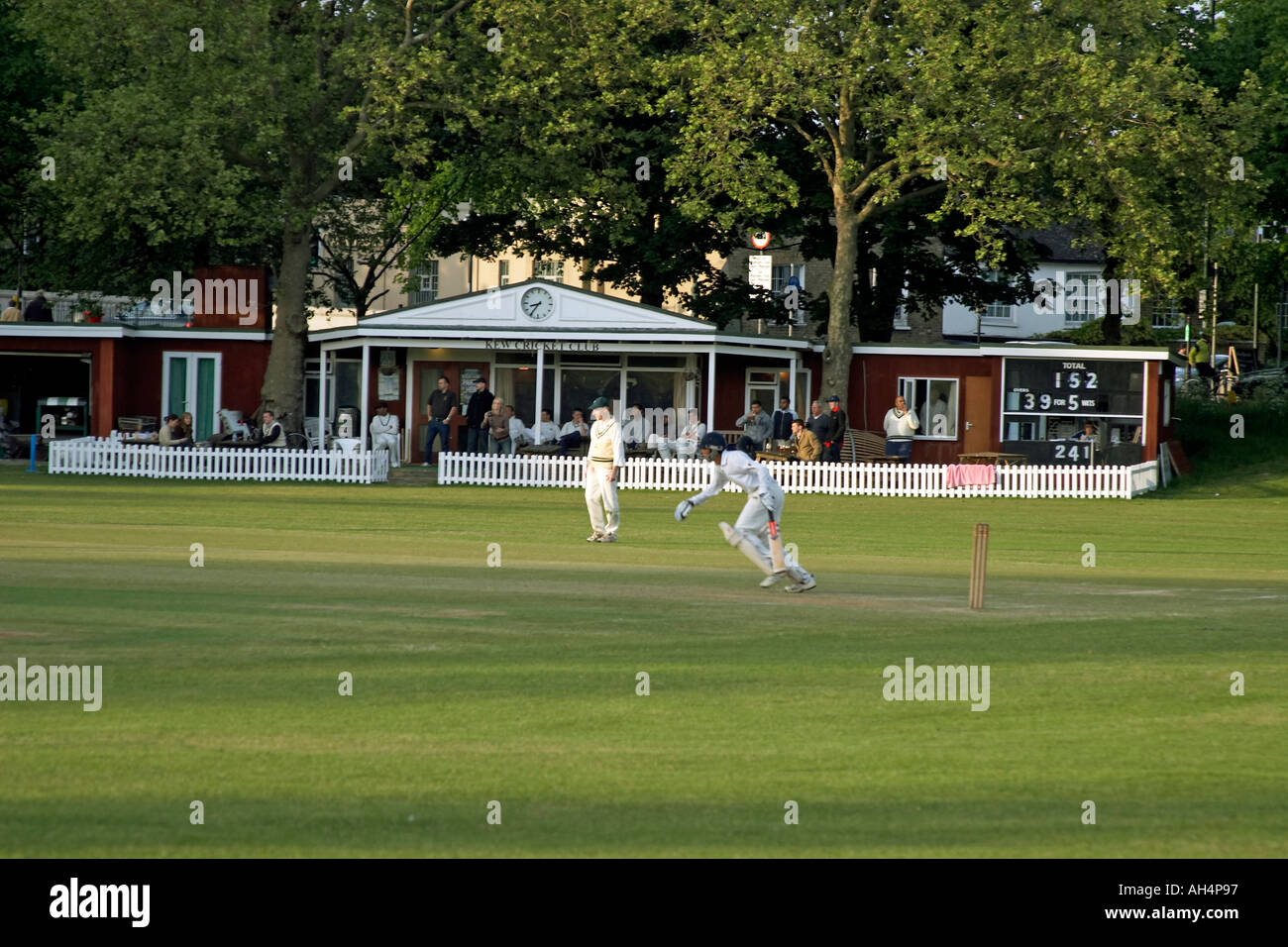 Evening cricket match on Kew Green London TW9 England  Stock Photo