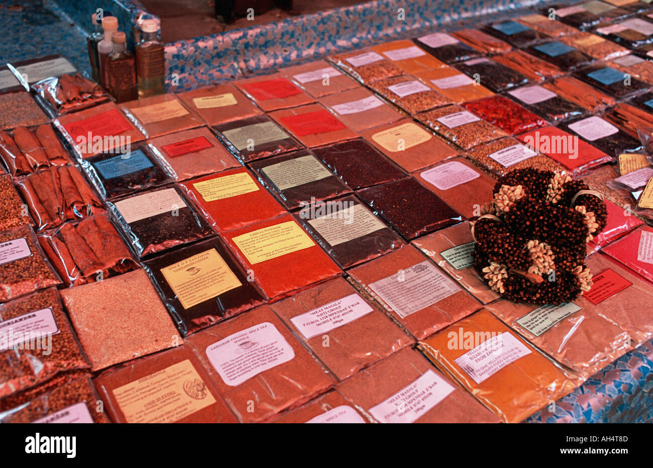 Packaged spices and curry powder for sale at market Stone Town Zanzibar