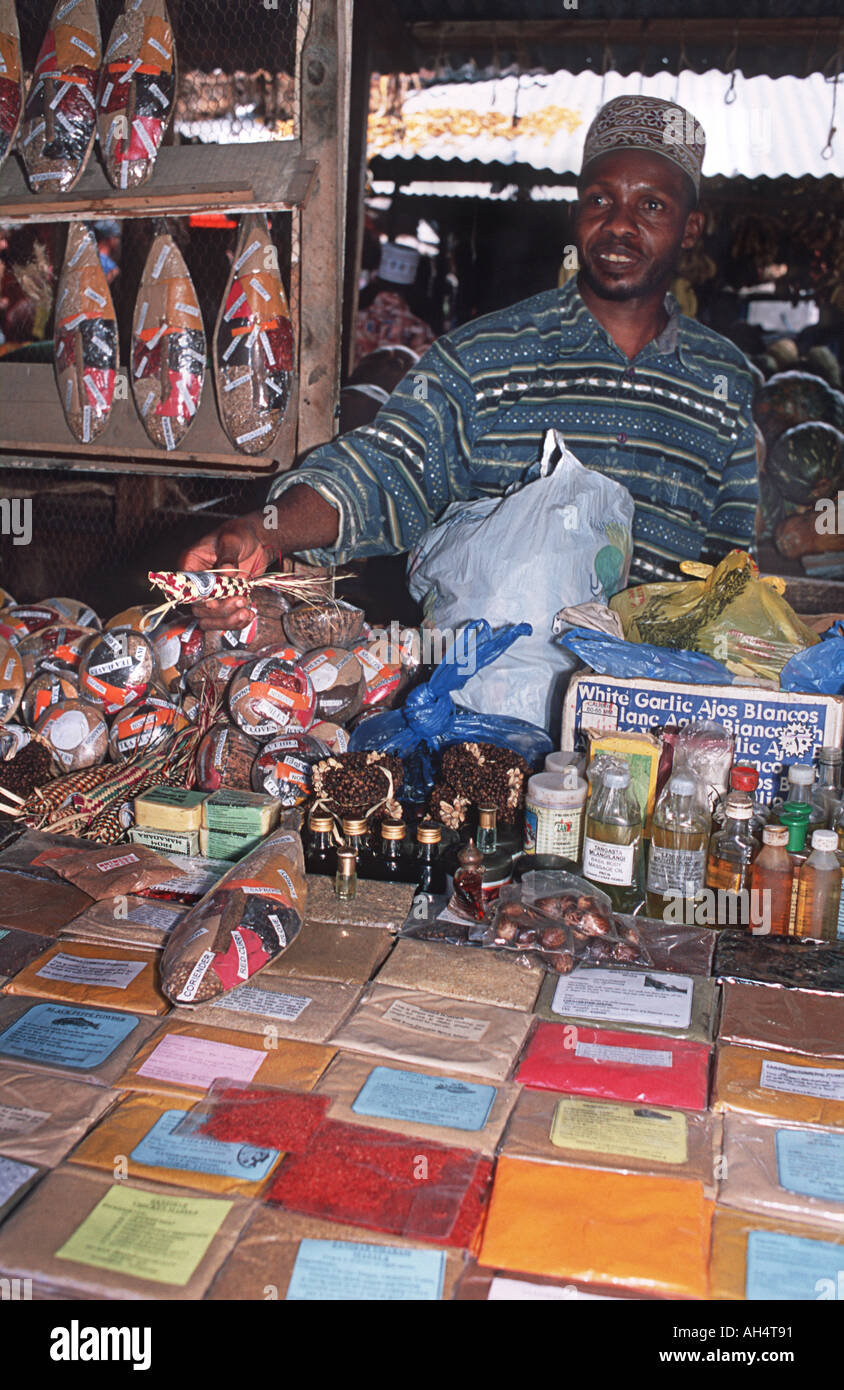 Vendor selling pacakged spices and curry powder at market Stone Town