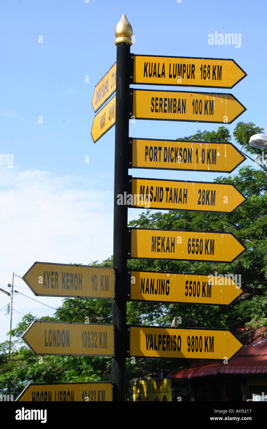 Malacca tourism signpost with worldwide destinations and distances Stock Photo