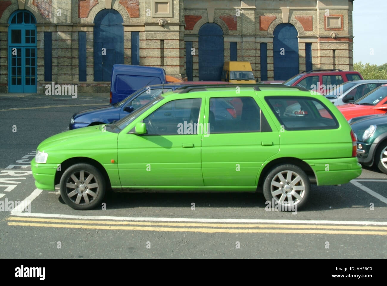 North London bright green car in car park superstitions supposedly surround this choice of colour also more difficult to sell Stock Photo