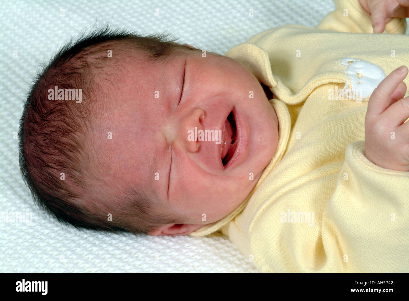Baby sleeping in cot Stock Photo Alamy