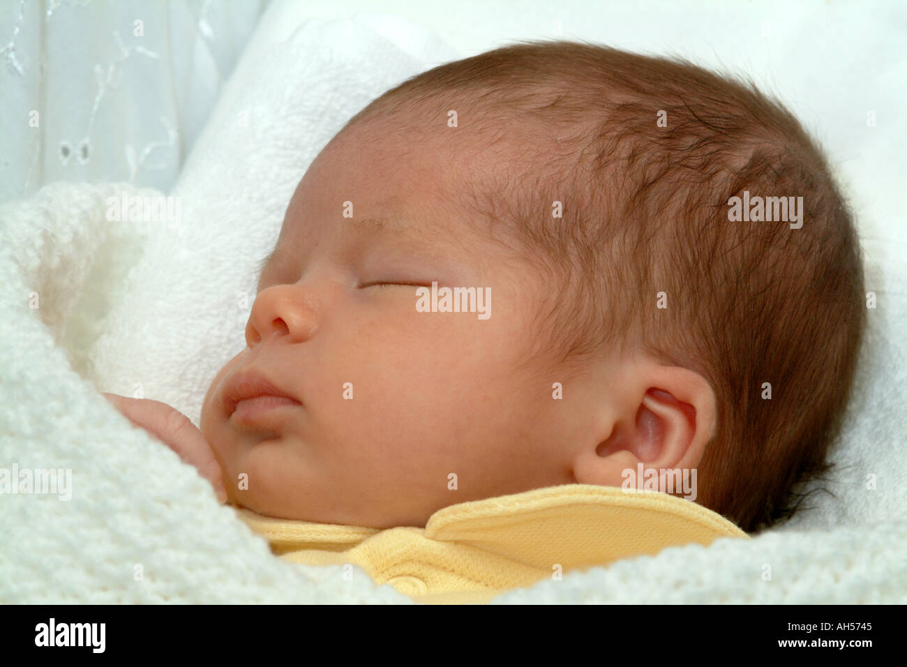 Baby sleeping in cot Stock Photo Alamy