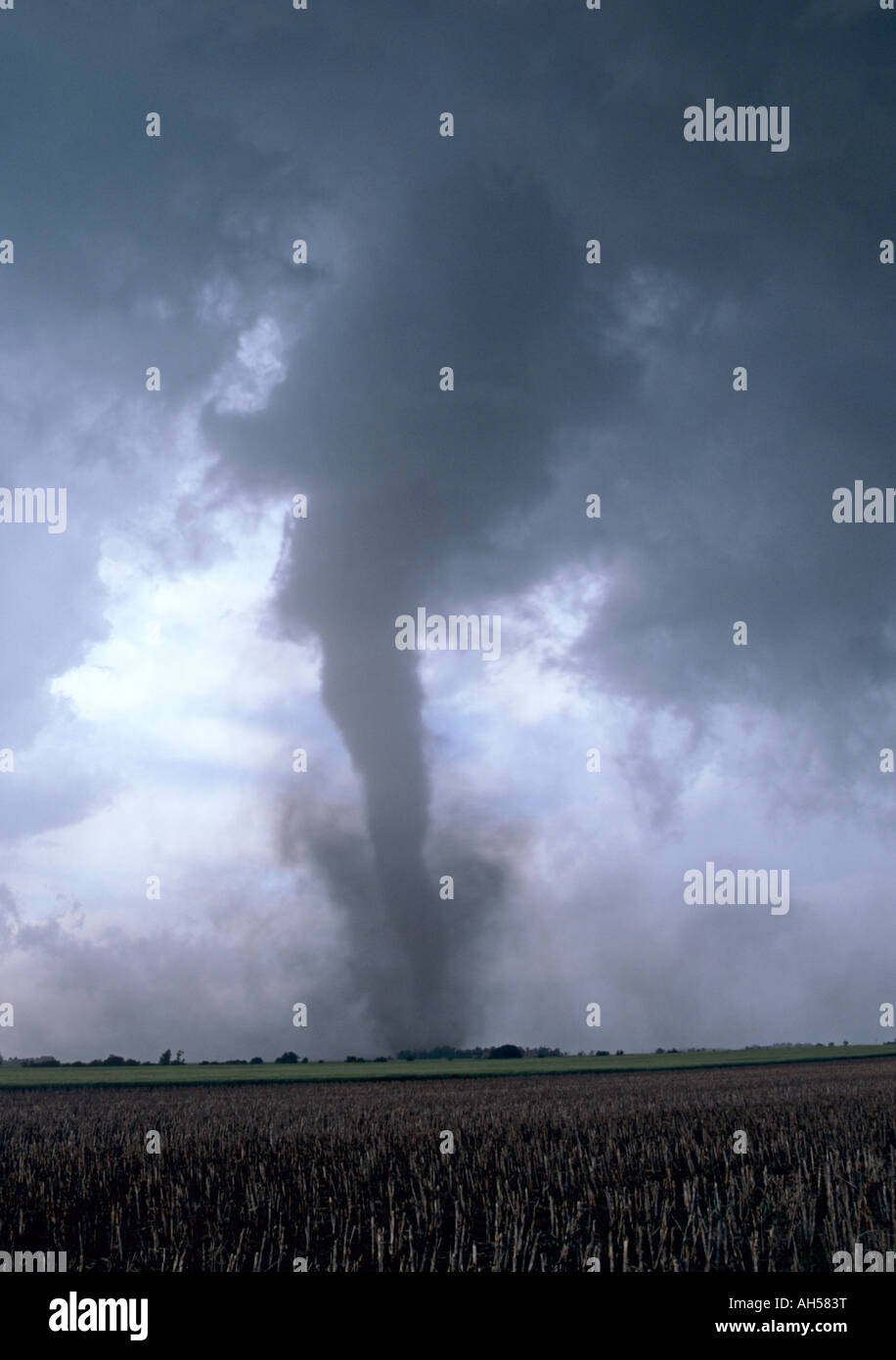 A portrait of a tornado over farmland in Nebraska, USA. Stock Photo