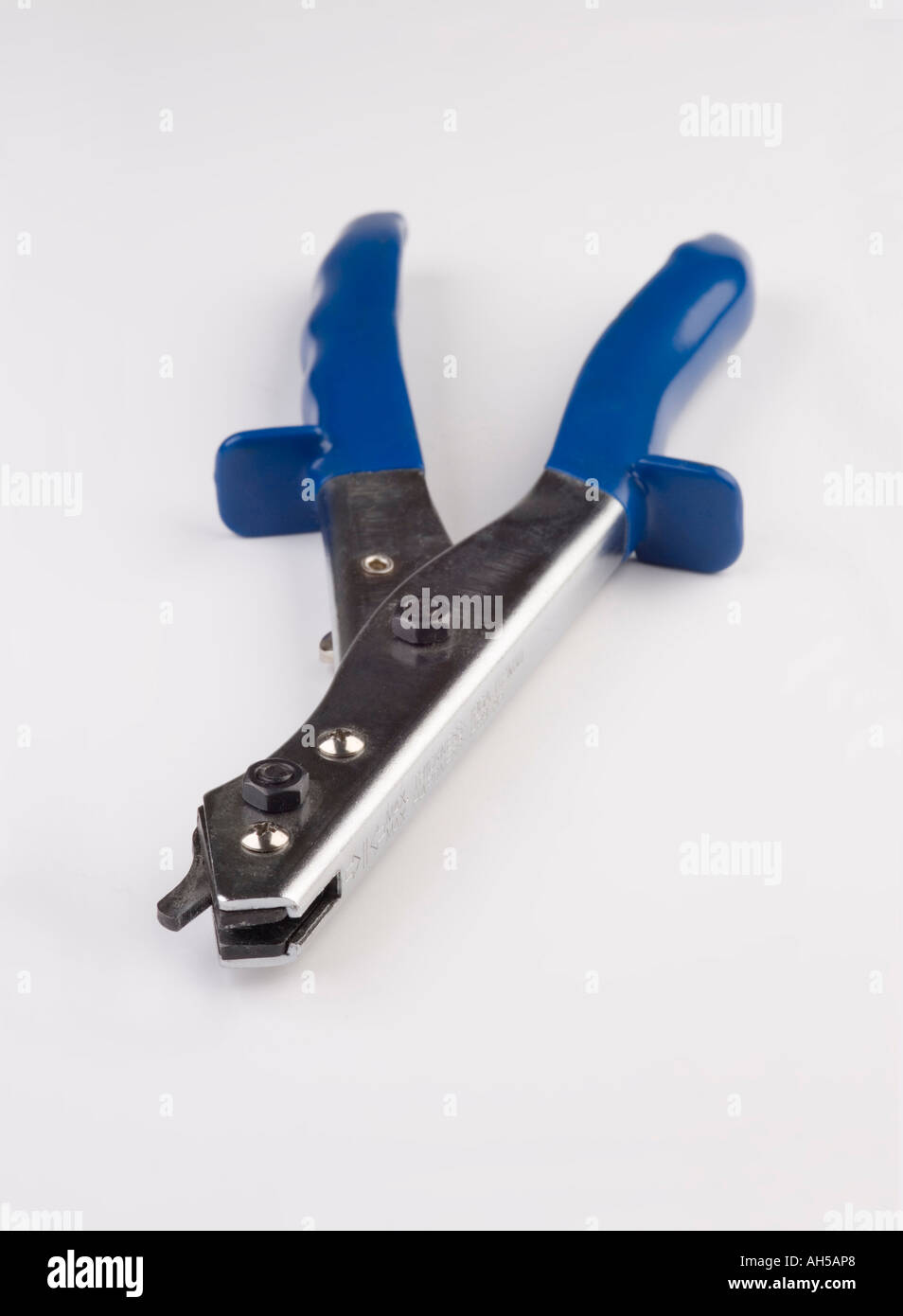 A nibbler tool for cutting up sheets of metal Stock Photo Alamy