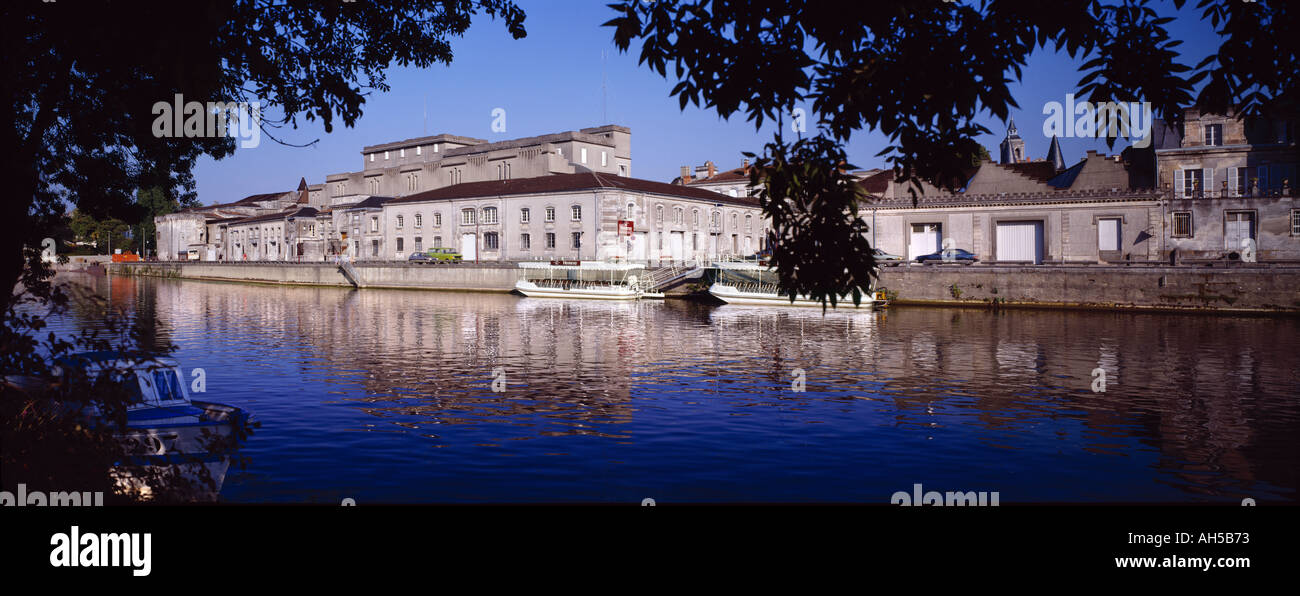 Hennessy Cognac building viewed over the Charente River Cognac Charente France Stock Photo
