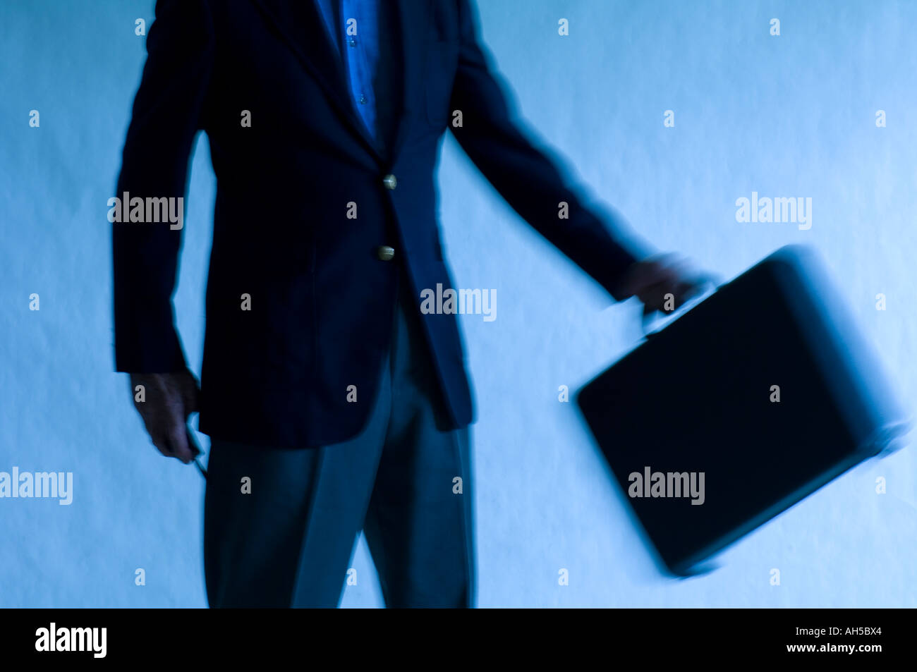 business man carrying  briefcase Stock Photo