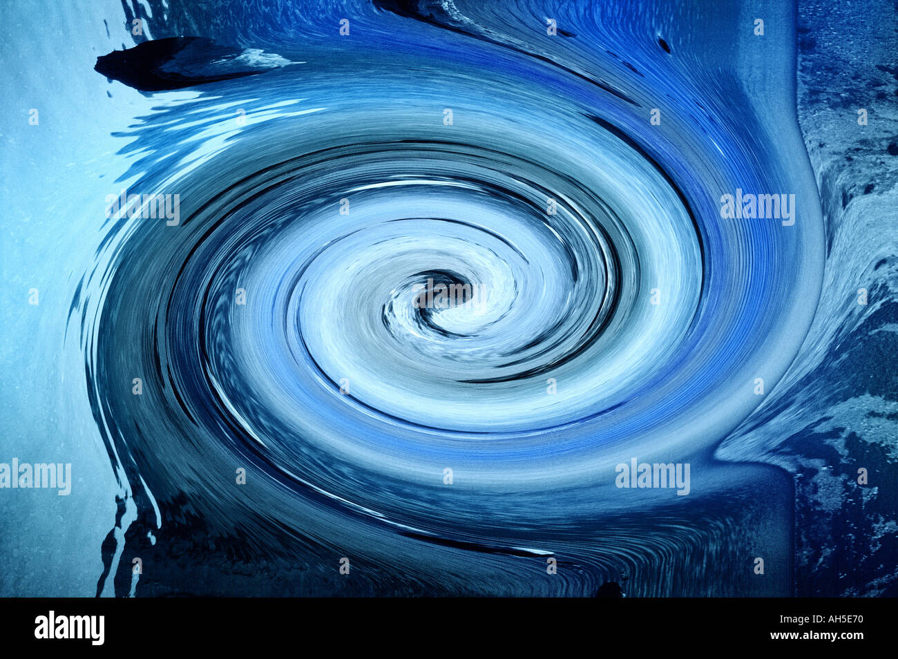Abstract circular blue swirls in water  Stock Photo