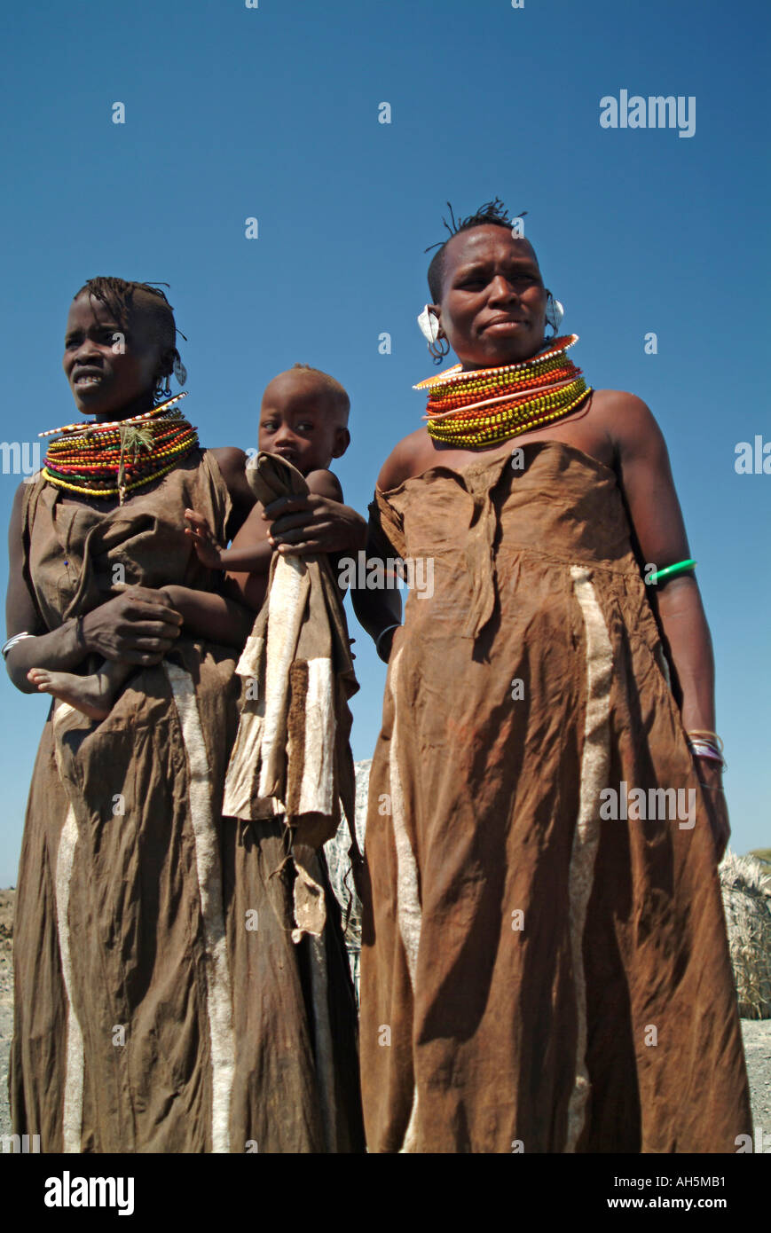 Turkana women and baby situated on the southeast shore of Lake Turkana, just 10 km north of Loiyangalani town. Northern Kenya Stock Photo