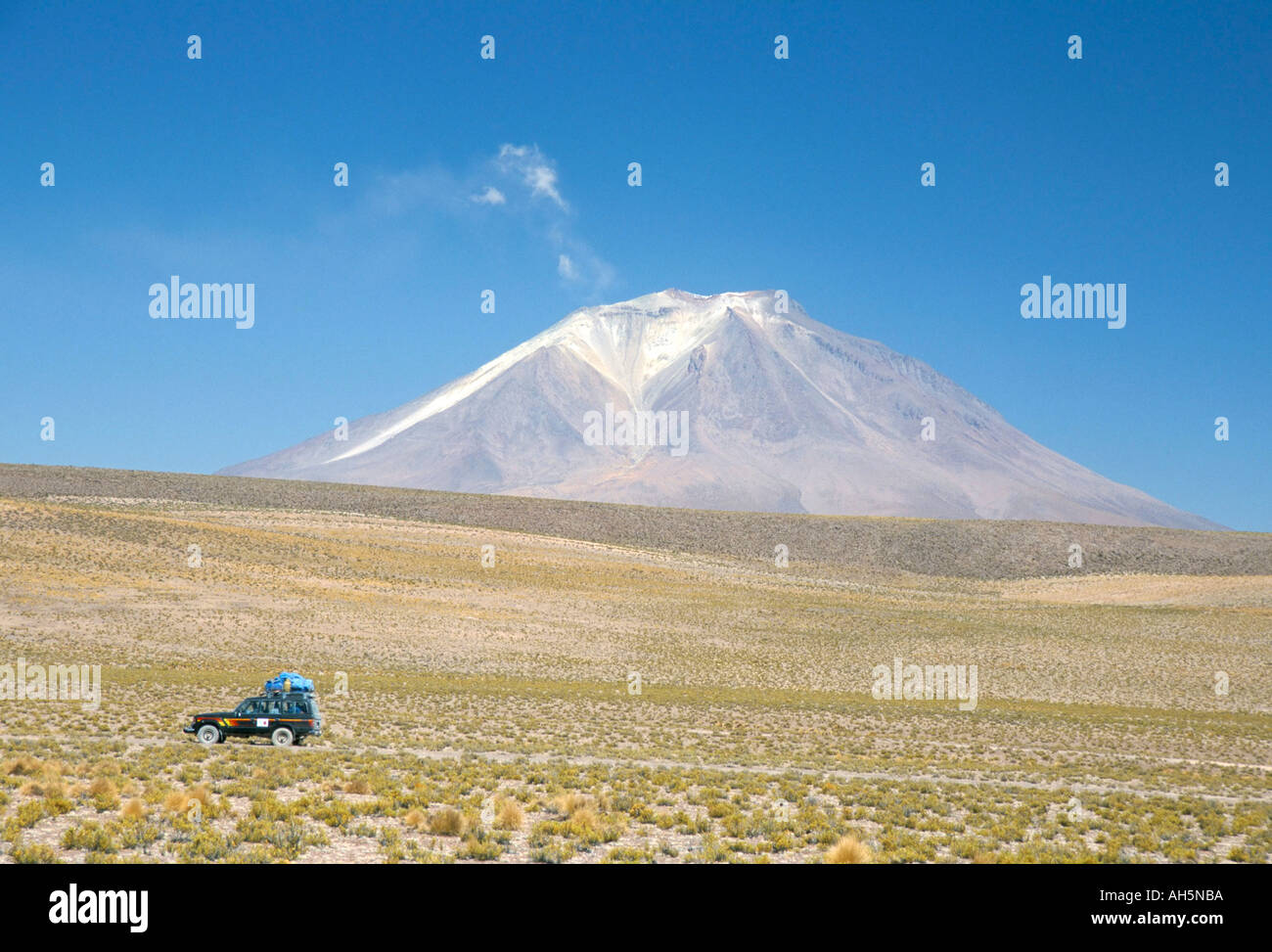 Ollague volcano with summit fumarole steam plume Andes mountains Bolivia South America Stock Photo