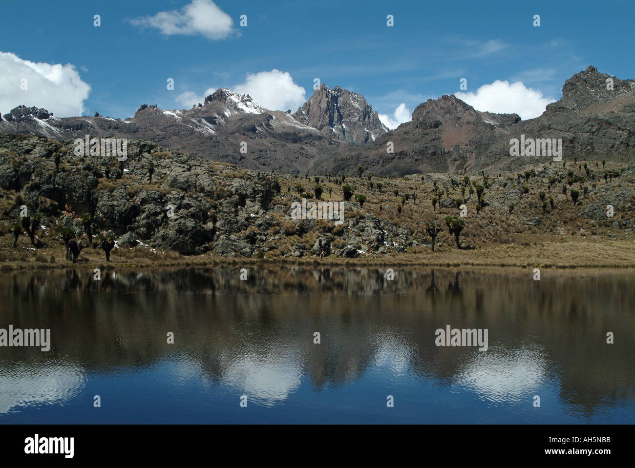 Batian Routes Reflection of three peaks of Lenana, Batian and Nelion in the mountain ...