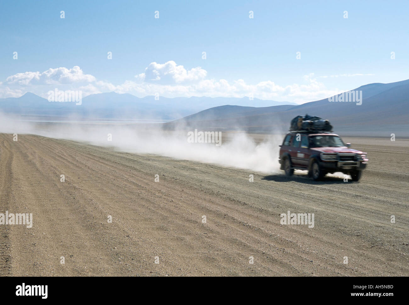 Land cruiser on altiplano track with tourists going to Laguna Colorado Southwest Highlands Bolivia South America Stock Photo