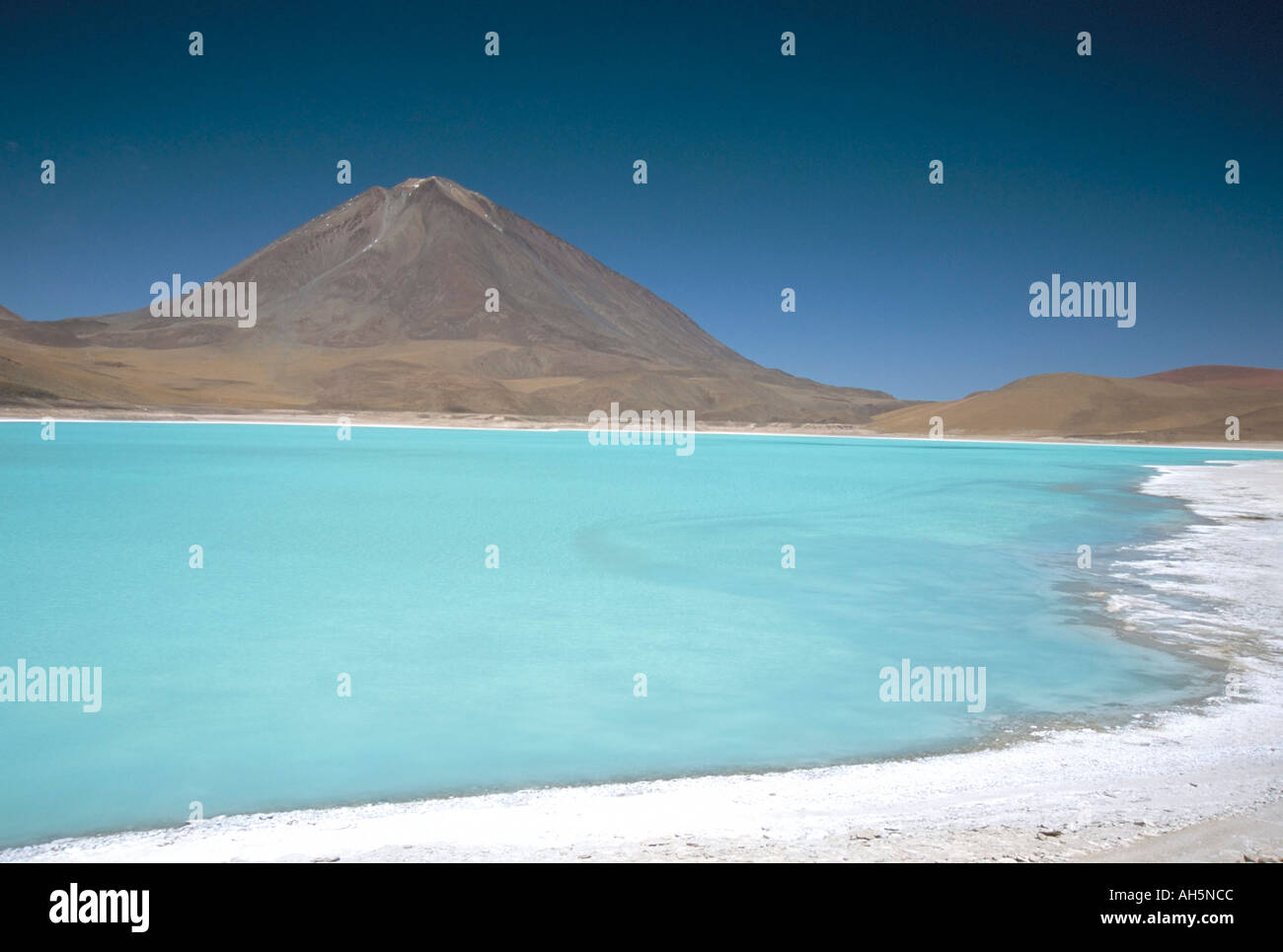 Laguna Verde with mineral flat margin and Volcan Licancabur 5960m Southwest Highlands Bolivia South America Stock Photo