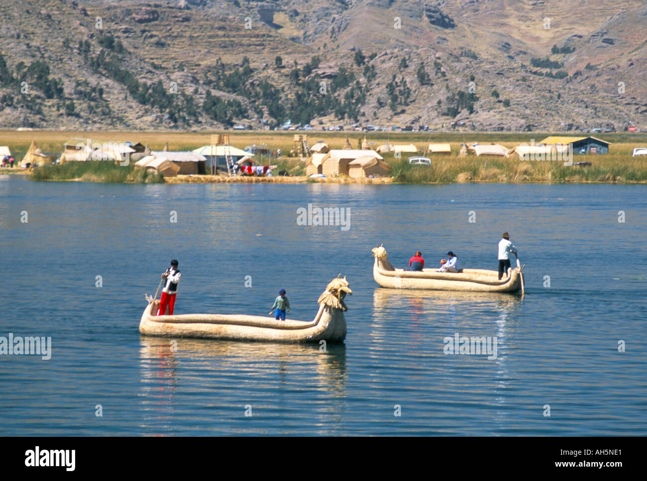 Traditional Uros Urus reed boats Islas Flotantas reed islands Lake Titicaca Peru South America Stock Photo