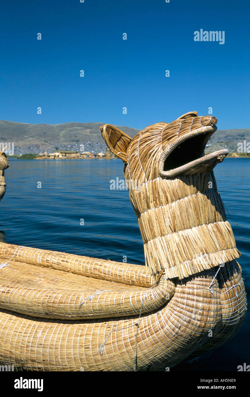 Traditional Uros Urus reed boat Islas Flotantas reed islands Lake Titicaca Peru South America Stock Photo