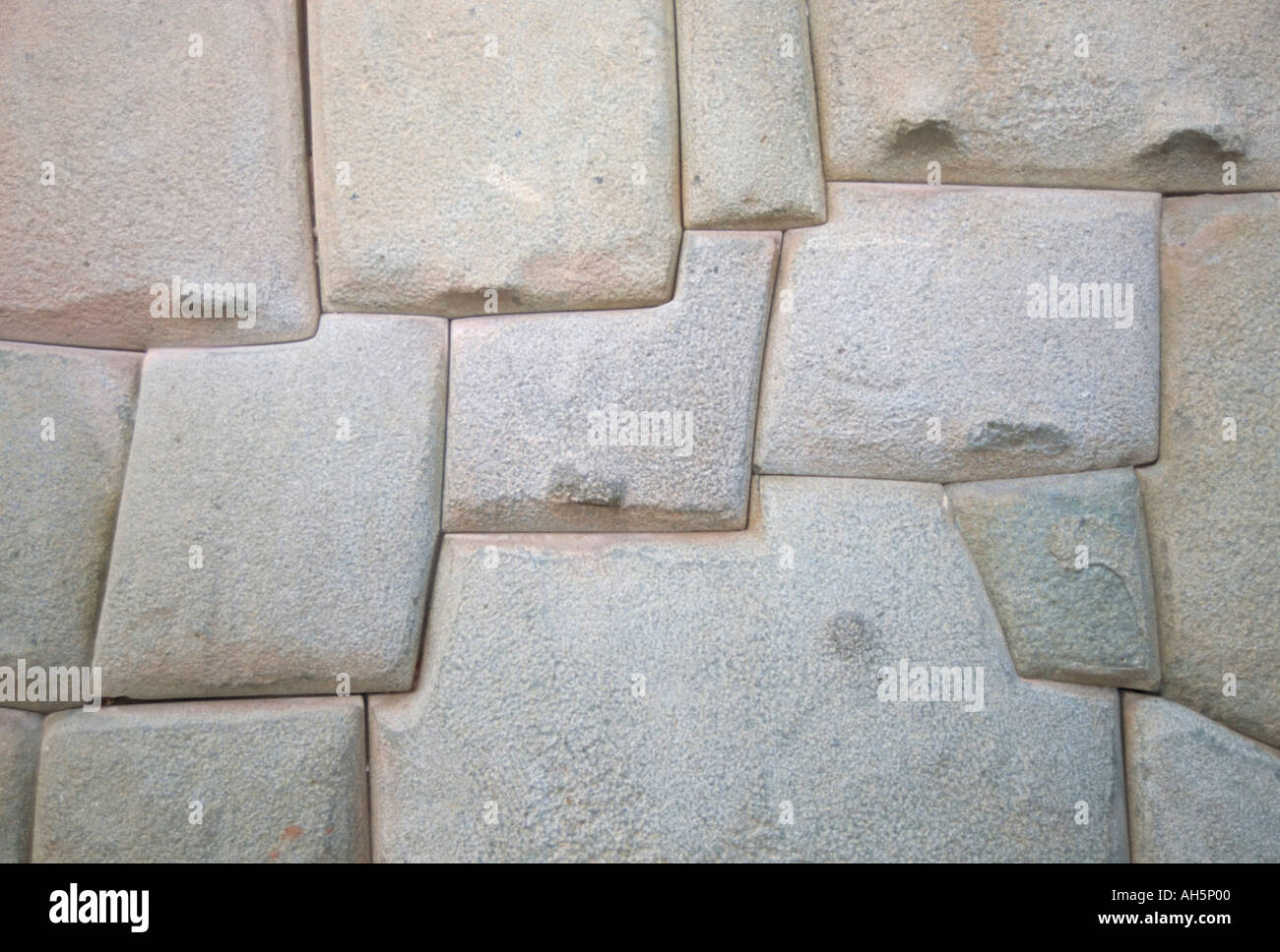 Interlocking Inca stonework in granite in old town now the Museo Arte Religioso Cuzco Peru South America Stock Photo
