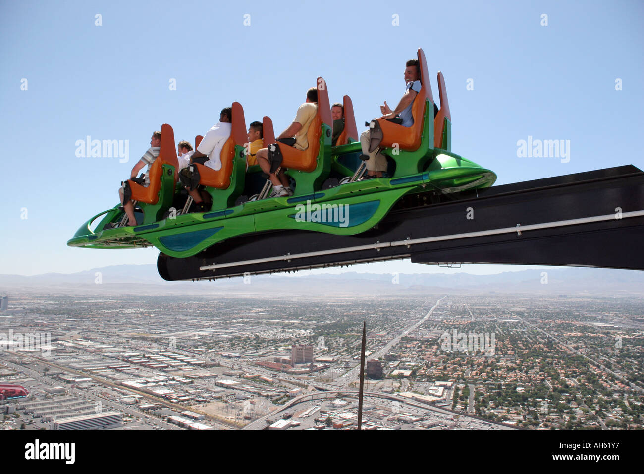 People enjoying the X Scream ride at the top of the Stratosphere Tower in Las  Vegas Stock Photo - Alamy