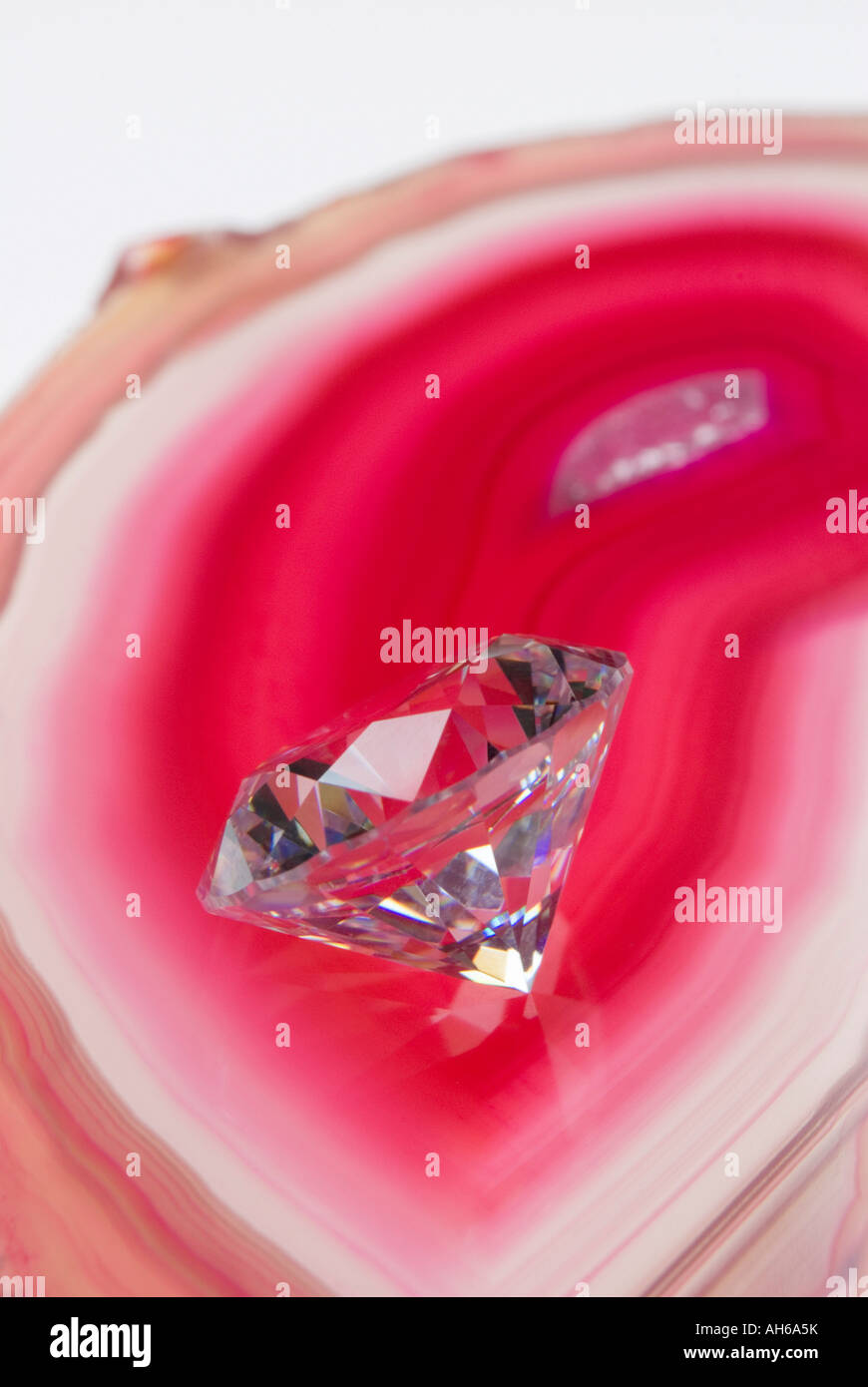 Round cut diamond on Geode slice Stock Photo