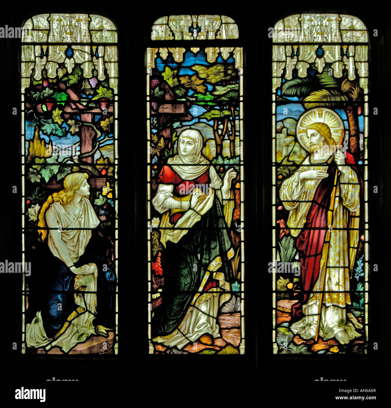 Christ with Mary and Martha in their garden . South aisle , West , window . All Saints Church , Orton , Cumbria , England , U . Stock Photo