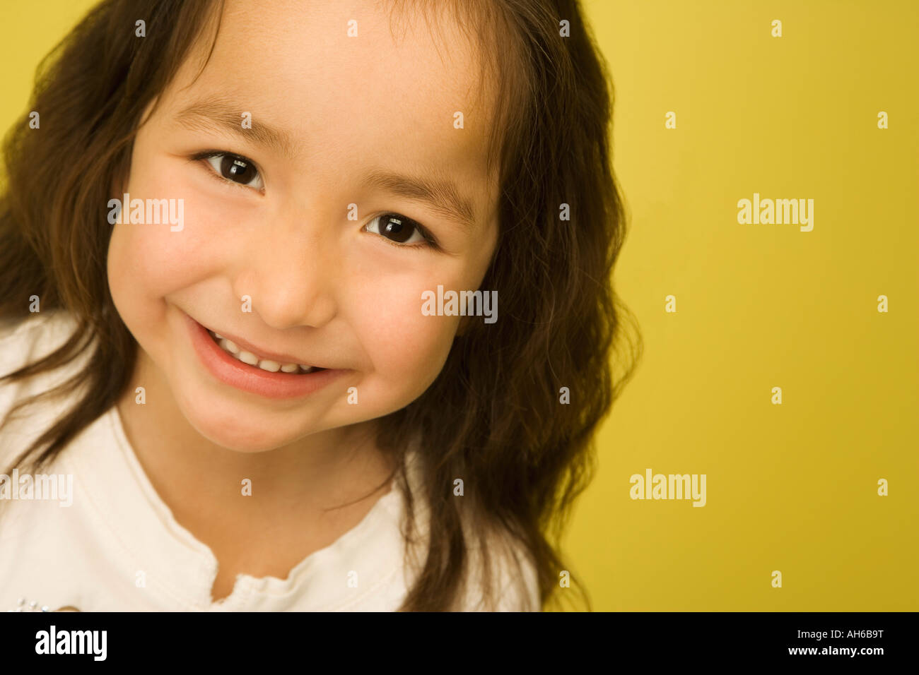 Portrait of little girl smiling Stock Photo - Alamy