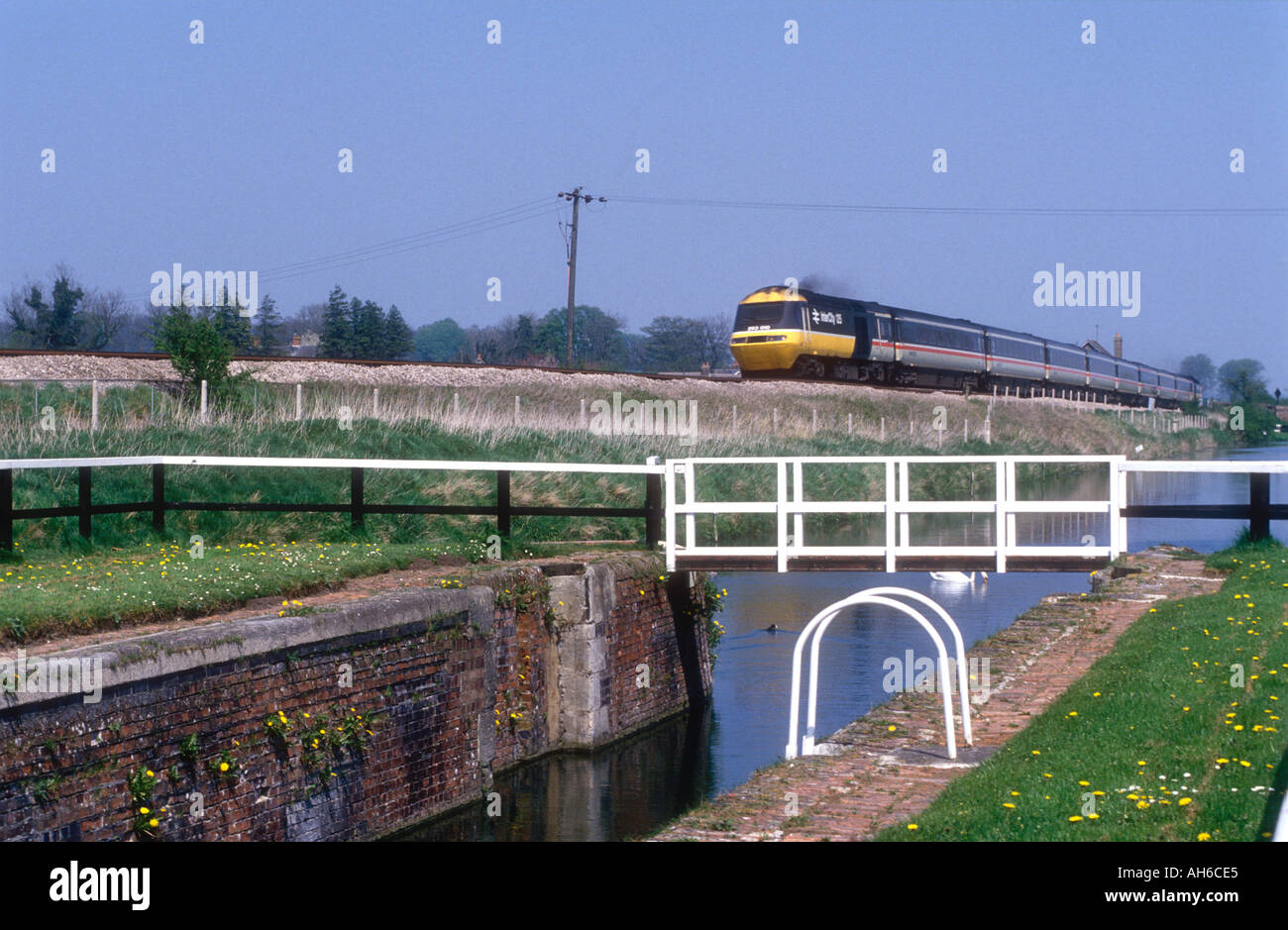 The railway and the Kennet and Avon Canal at Crofton in Wiltshire England UK Stock Photo