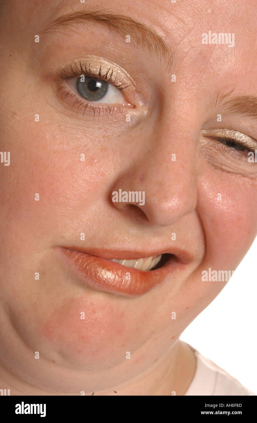 Woman pulling a weird facial expression Stock Photo