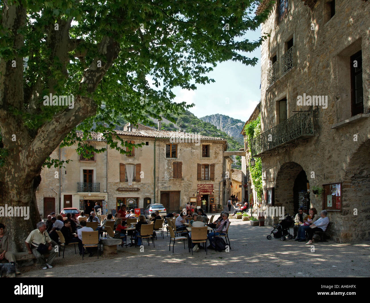 people in open air restaurants on market place of the pilgrim place ...