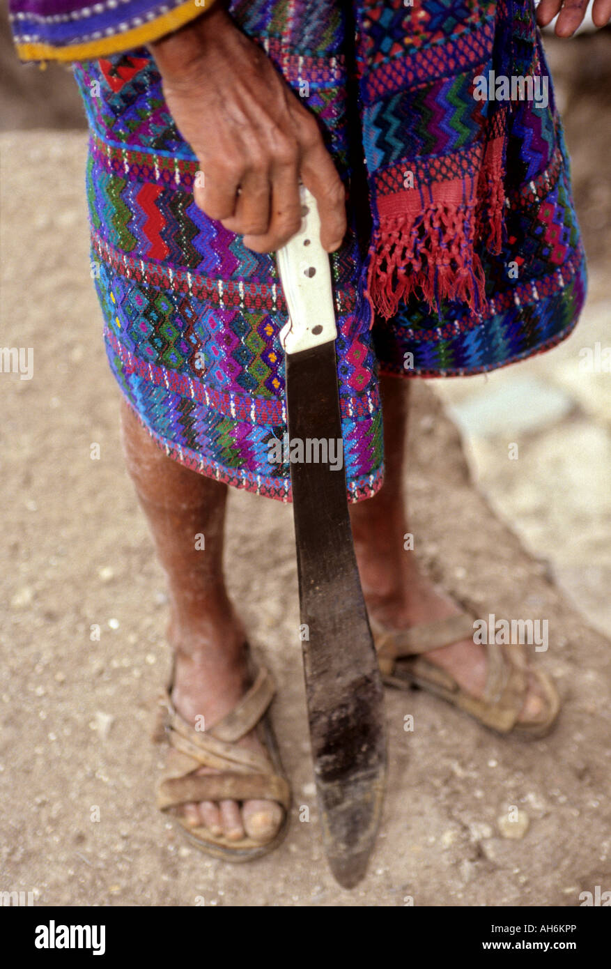 Traditionally clothed man holding machete Lake Atitlan Guatemala Stock