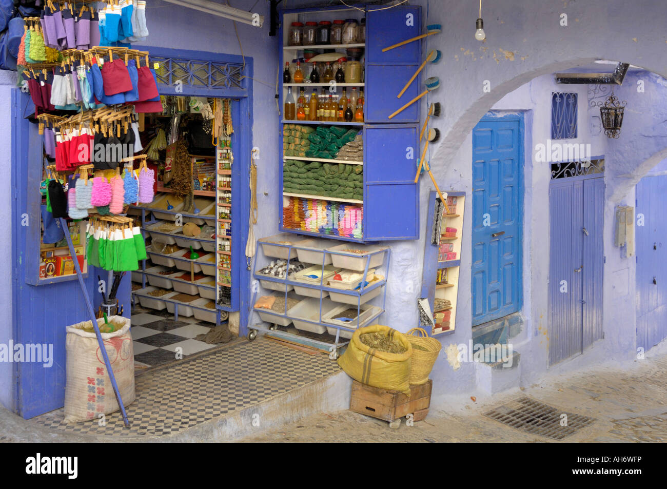 Traditional roadside general store selling variety of household things Chefchaouen Morocco North Africa Stock Photo