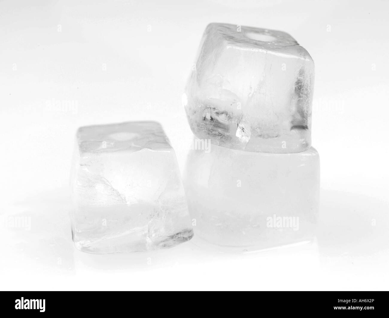 Ice cubes cube icy iced frozen food Black and White Stock Photos