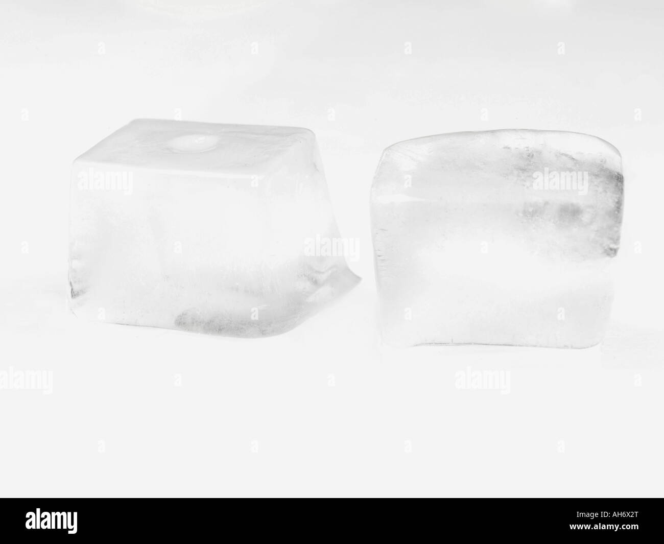 Ice cubes cube icy iced frozen food Black and White Stock Photos