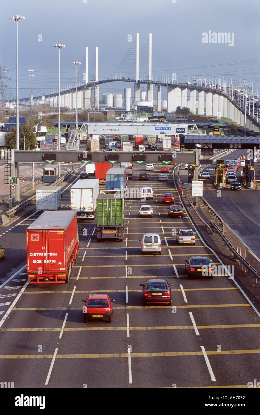 Queen Elizabeth bridge London over Thames river showing cars and lorries traveling through toll bridge area Stock Photo