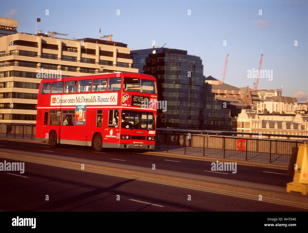 London bus crossing London bridge  Stock Photo
