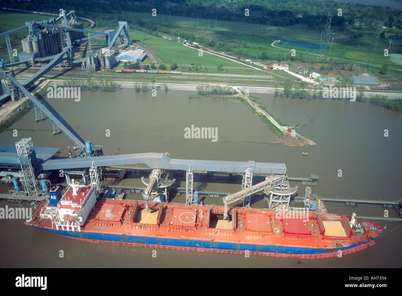 Bulk cargo ship takes on a load of grain on the Mississippi River near