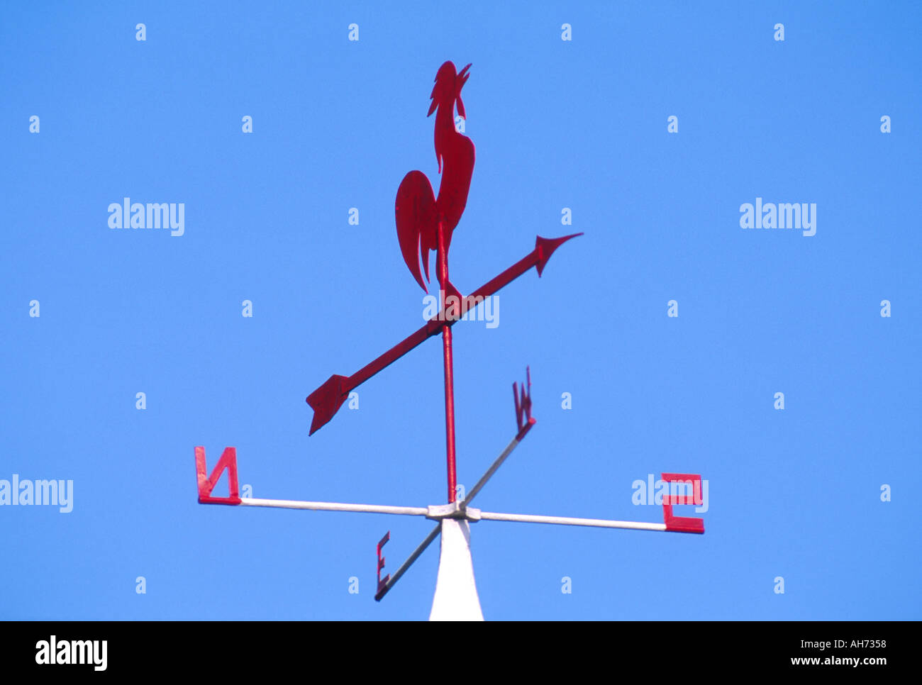 weathervane atop barn indicates wind direction Stock Photo Alamy