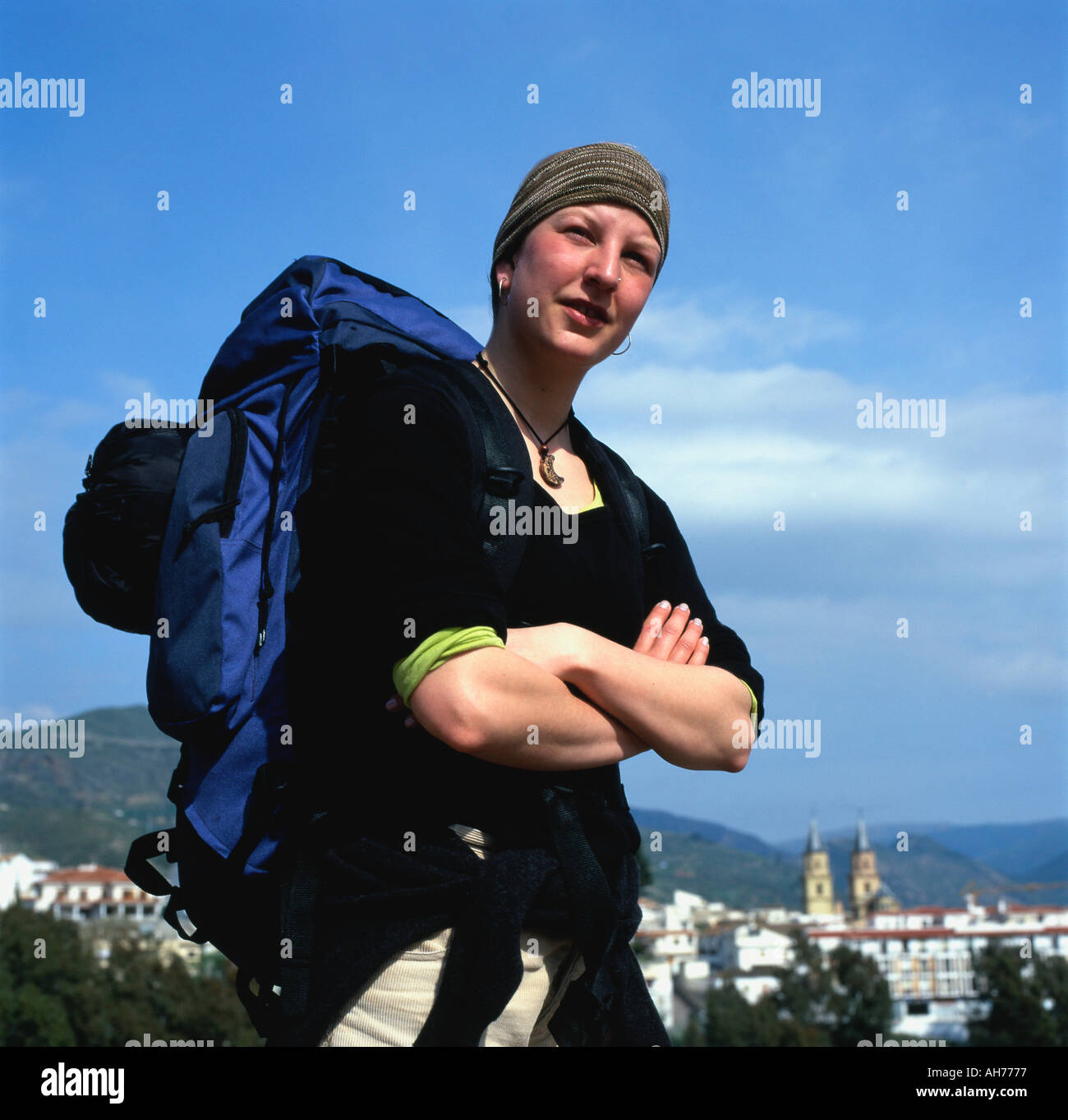 Danish woman traveler with backpack rucksack in Orjiva Andalucia