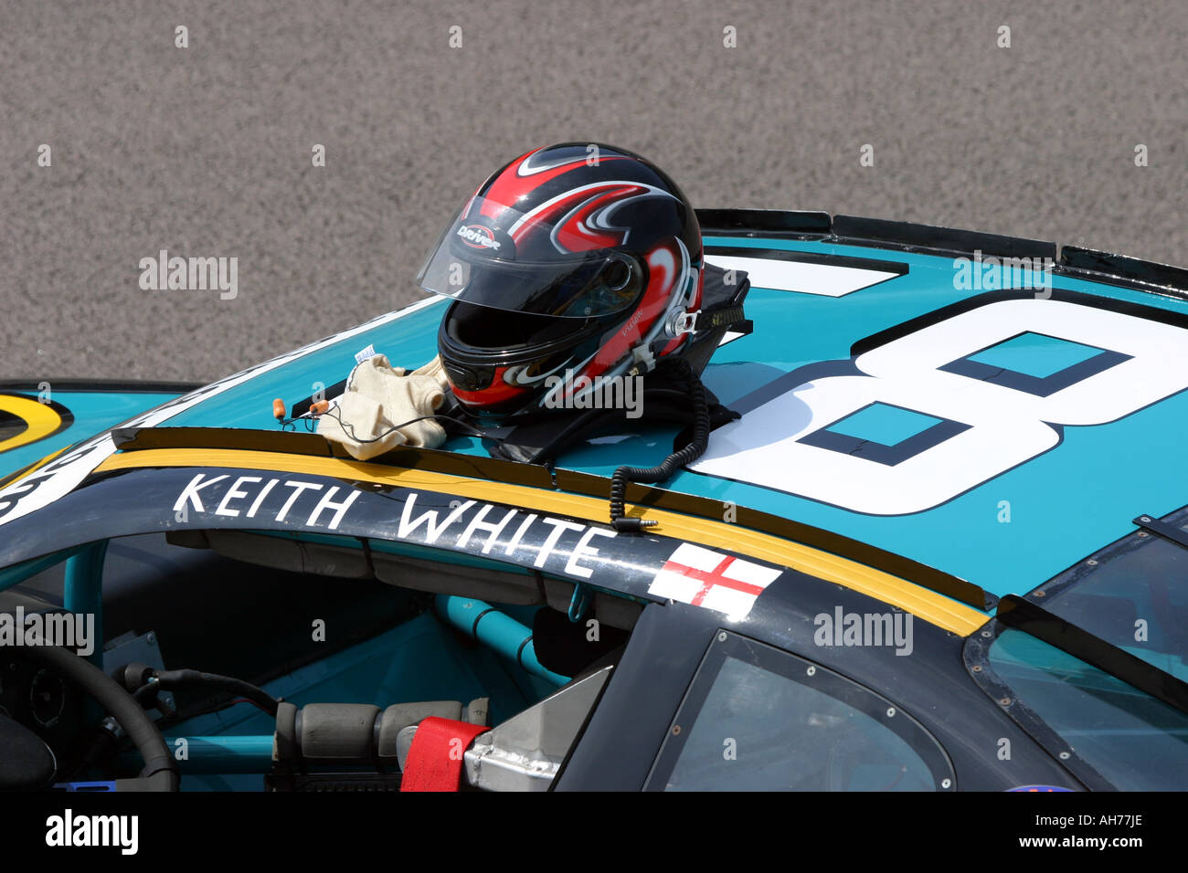 Crash Helmet on the Roof of a V8 Stock Car Stock Photo Alamy
