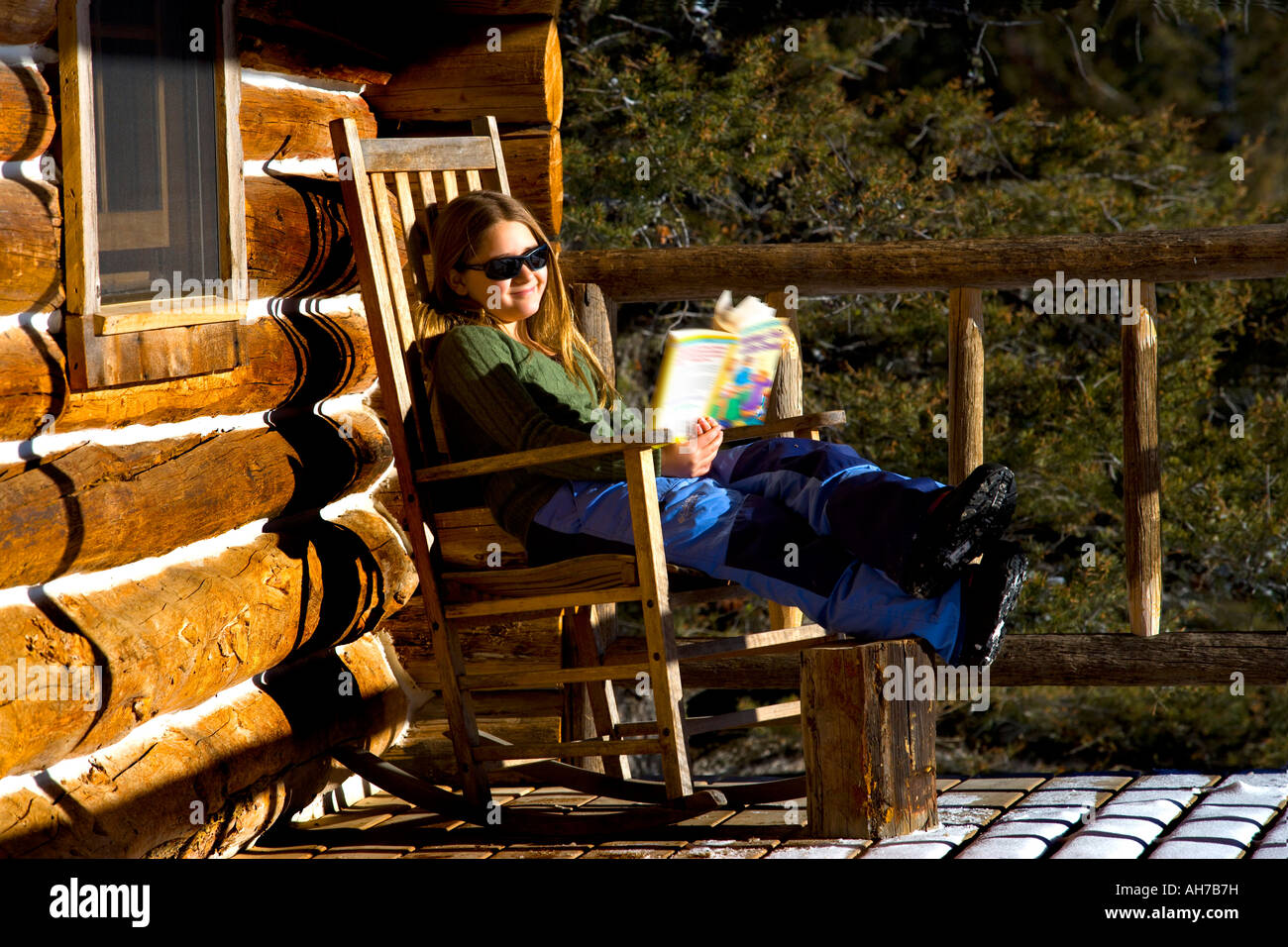 Girl sitting in rocking chair hi-res stock photography and images - Alamy