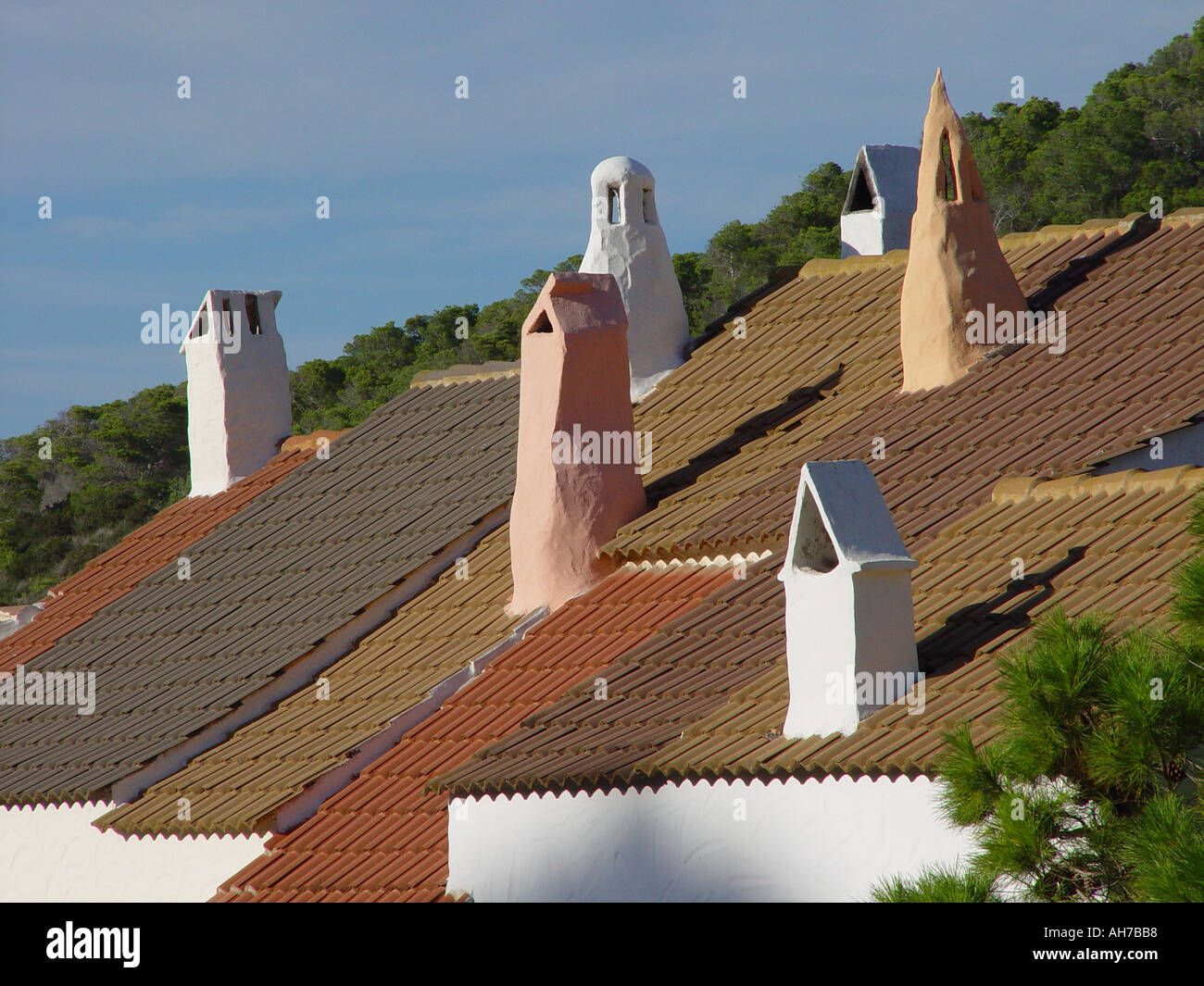 chimneys on spanish rooftops in the Balearic island of Stock