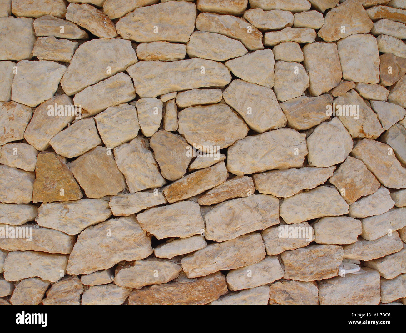 Stone wall on Balearic Island of Ibiza showing fine stone masonary  craftmanship Stock Photo - Alamy