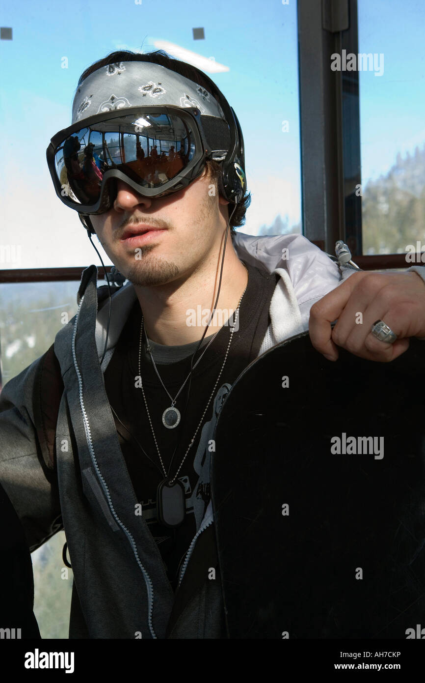 Young man wearing ski goggles Stock Photo